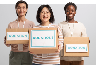 Group of people with donation boxes